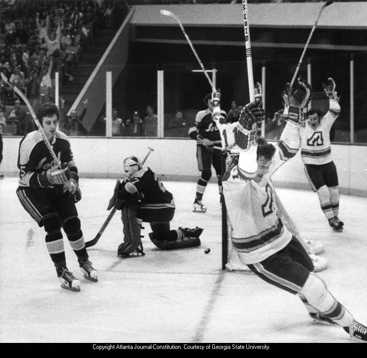 Jacques Richard of the Atlanta Flames scores a goal against Golden Seals, 1973.